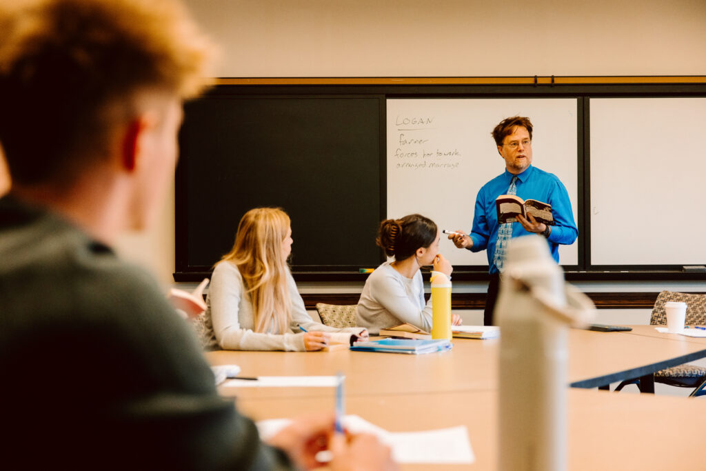 Professor with students in a seminar